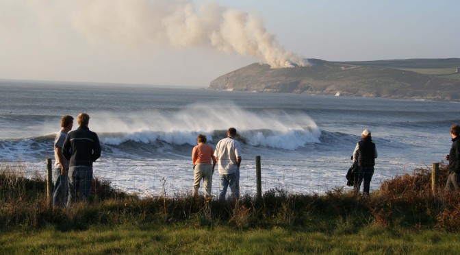 Croyde beach, big waves and burning bracken